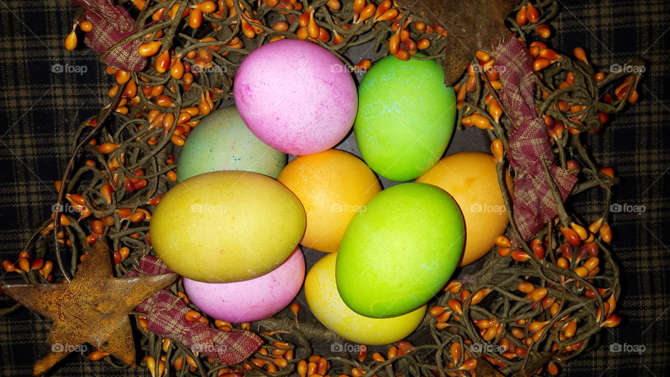 Primitive egg nest. dyed eggs in a primitive easter nest