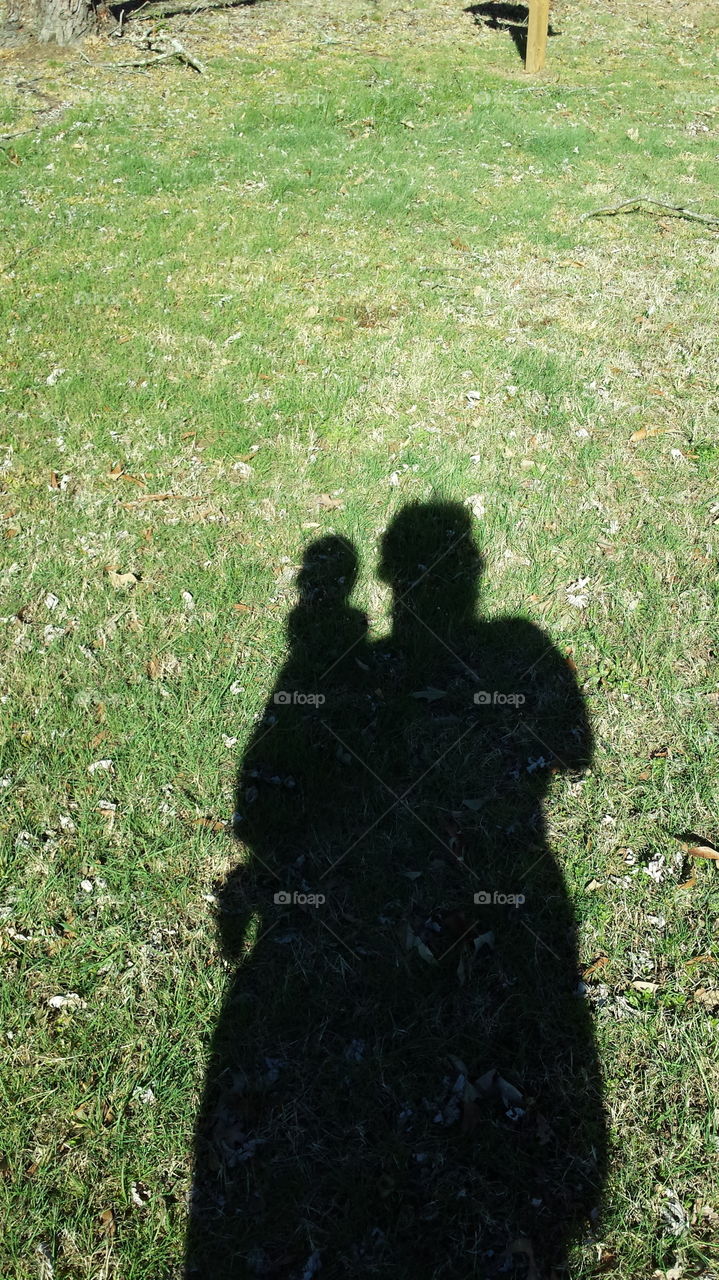 My son and I in shadow.