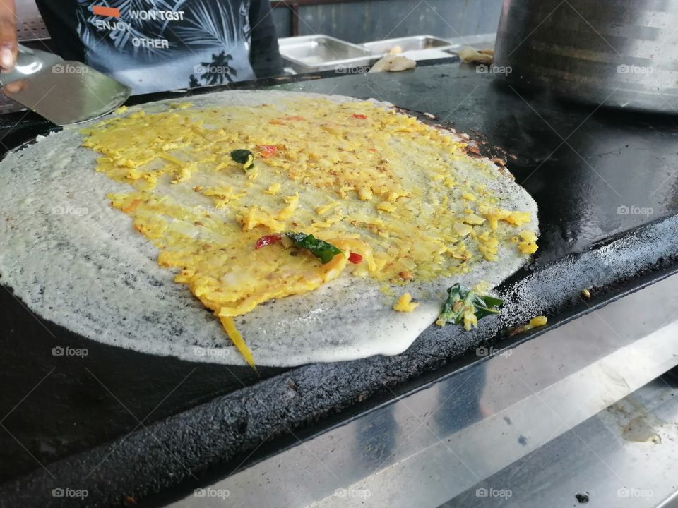 Dosas are a typical part of the Southern Indian
but the dish is now popular all over the Indian subcontinent. Traditionally, dosas are served hot along with sambar, a stuffing of potatoes, and chutney.