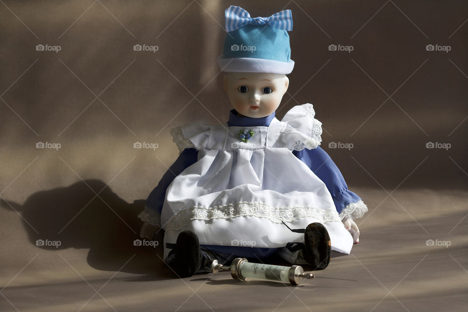 old doll and cannula