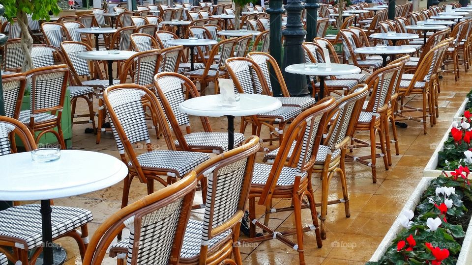 tables and chairs are ready for the day at Cafe de Paris in Monaco.