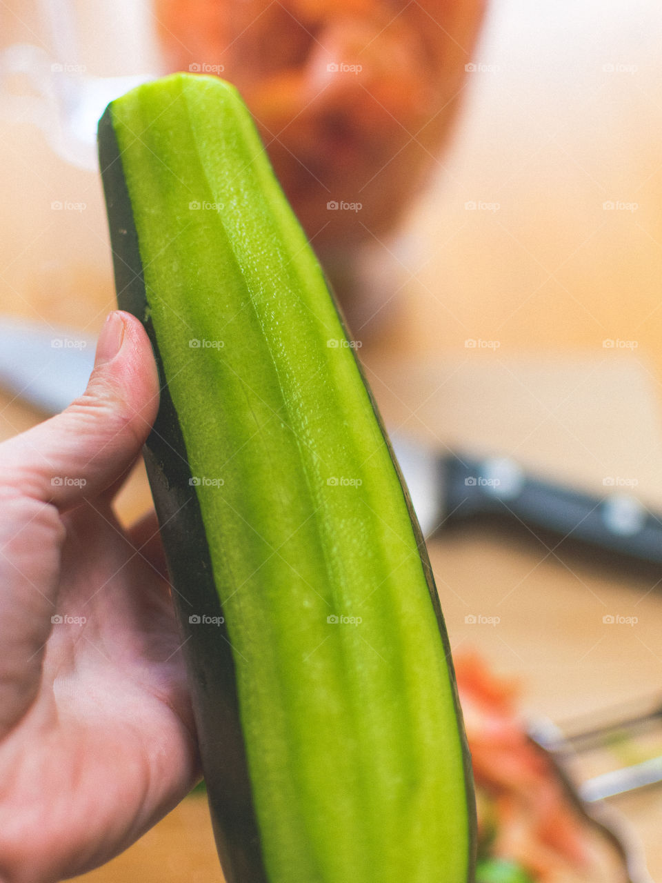 Peeling a zucchini