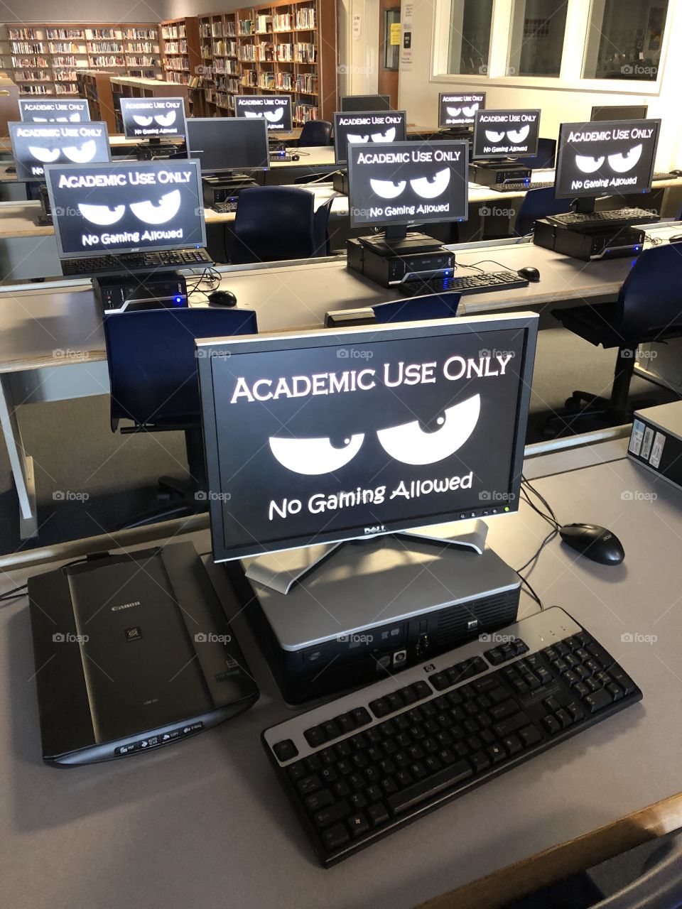 Academic Use Only desktop computers in computer lab inside library