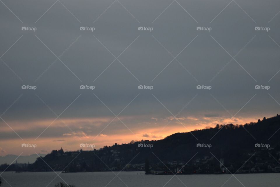 Lake Constance in winter. Landscape shot in grey and orange
