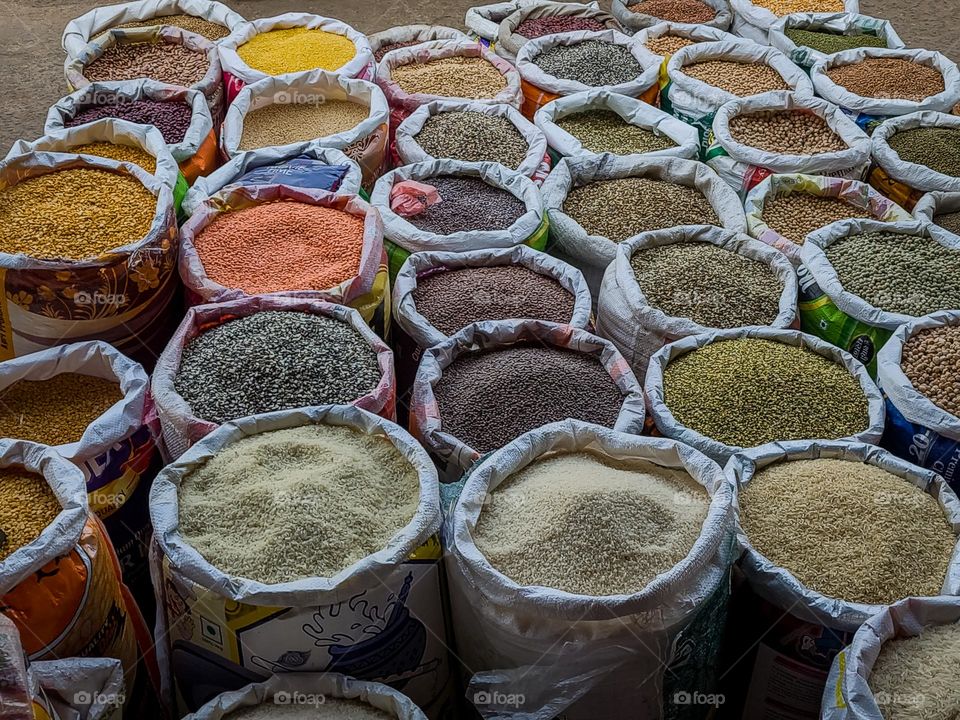 Presentation of different pulses and rice how colorful these sacks filled