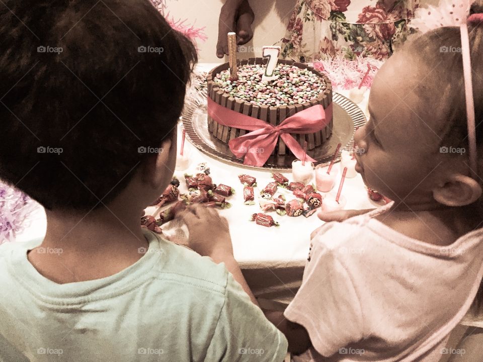 Children talking at birthday party