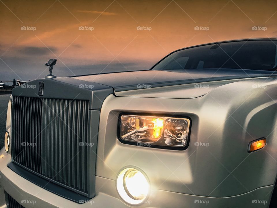 Rolls Royce Ghost with Florida  Sunset. 