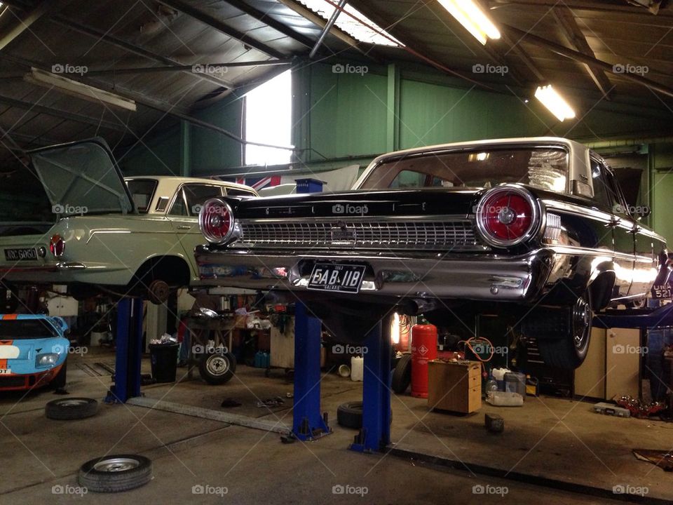 Classic Ford Galaxie up on a garage ramp