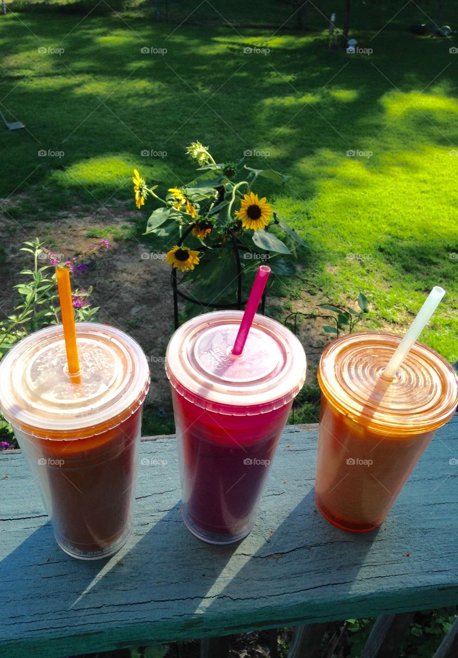 Iced Coffee Break. Late summer coffee break. I saw all our cups lined up before we sat down I had to put the flowers behind them; click!