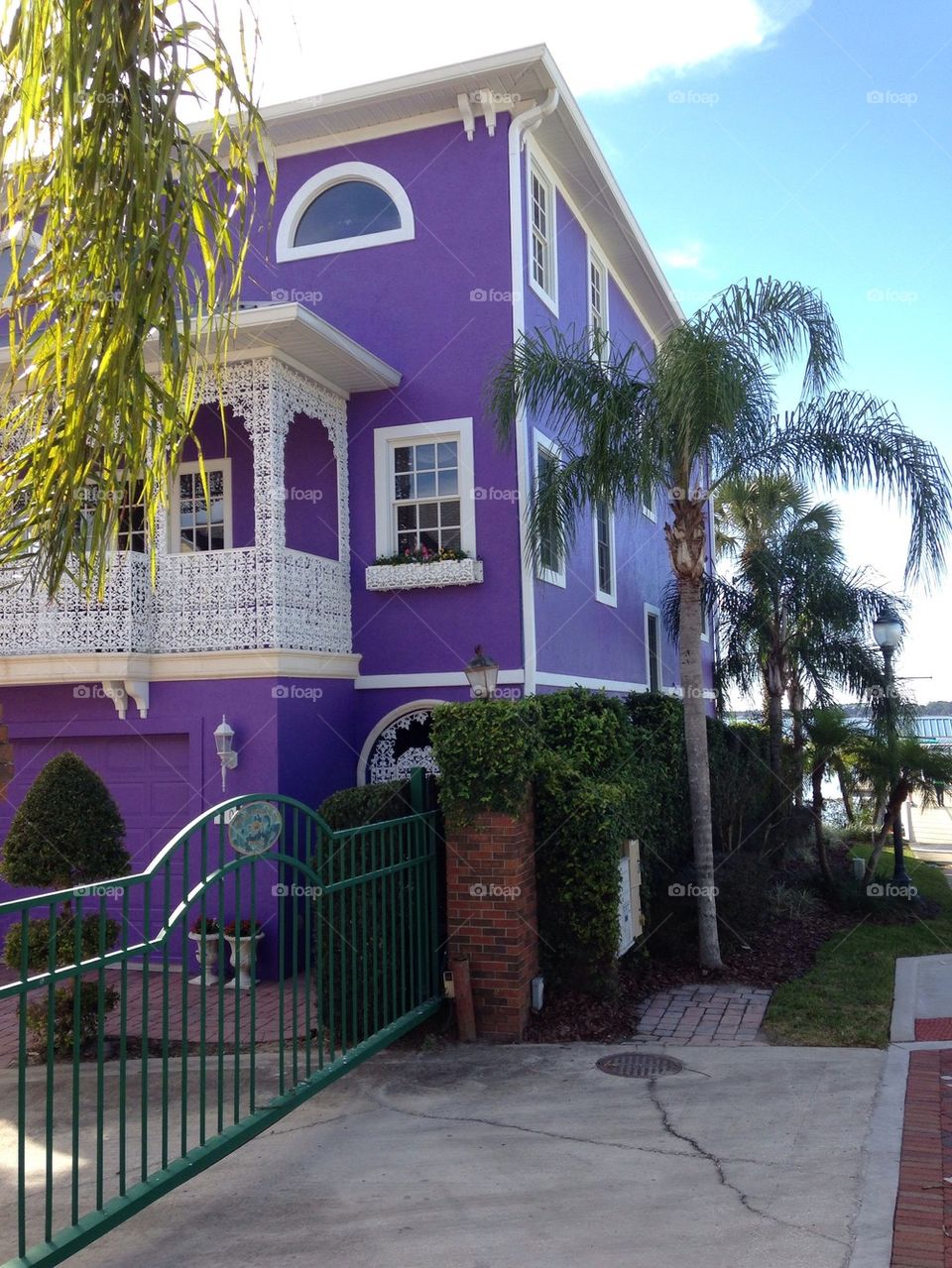 Purple balcony house on lake