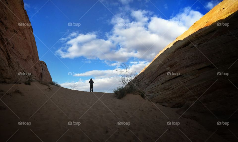 Man admiring nature's beauty at the trailhead at the valley of fire, Nevada
