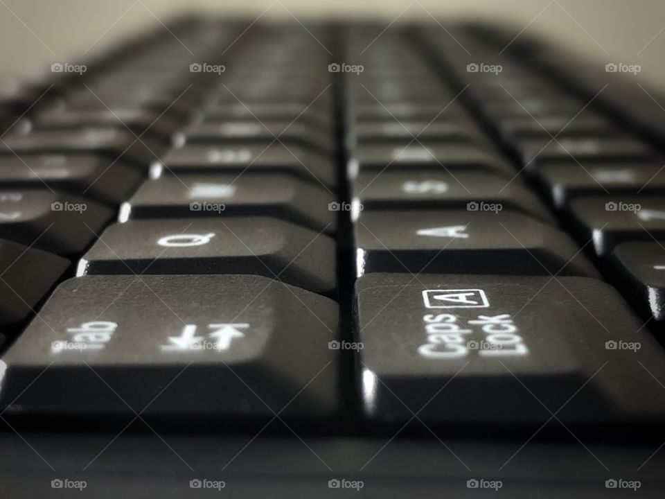 Black keyboard. Playing with the lines and symmetry, focus and perspective. A different view of a very useful and used tool.