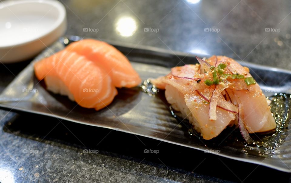 Fresh Nigiri  on a rectangular plate 