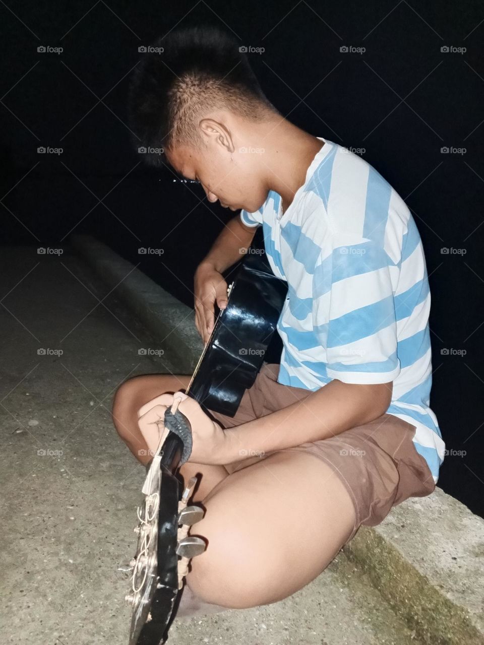 playing guitar