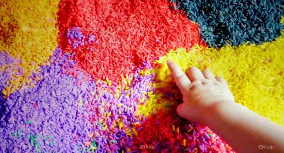 play time with colored rice