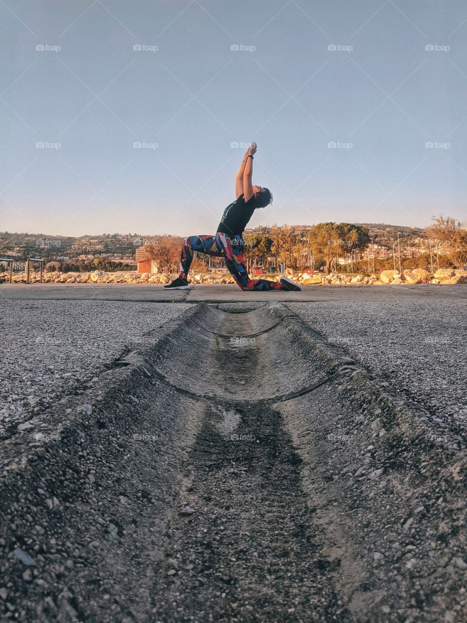 Portrait of beautiful young smiling woman doing yoga poses at the nature at spring. Healthy lifestyle