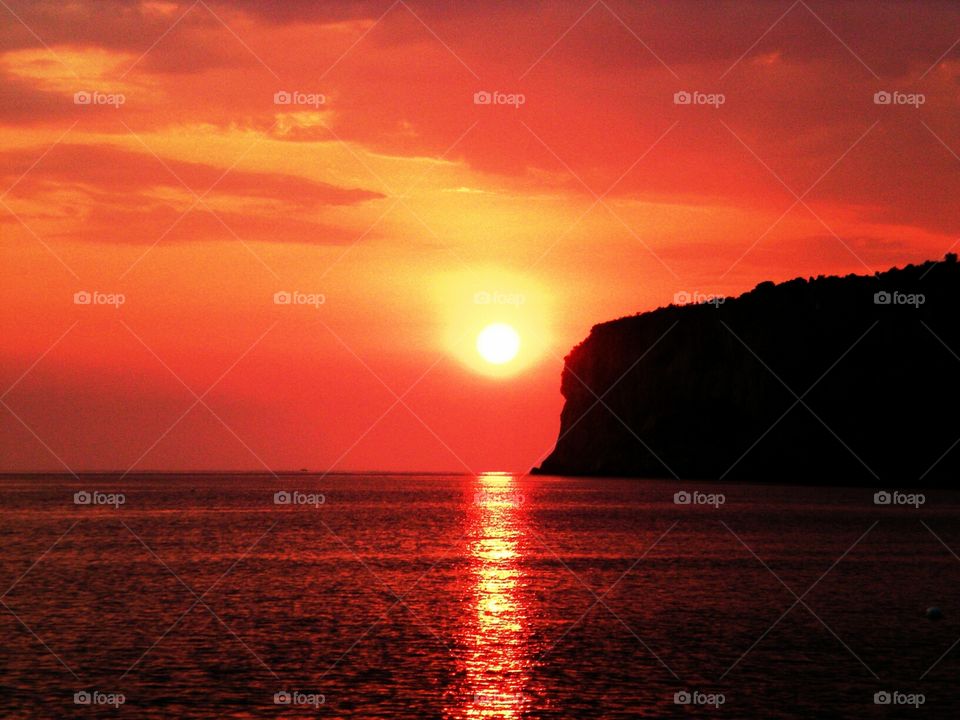 Fireball over the Islet of Dino. (Praia - Italy ).