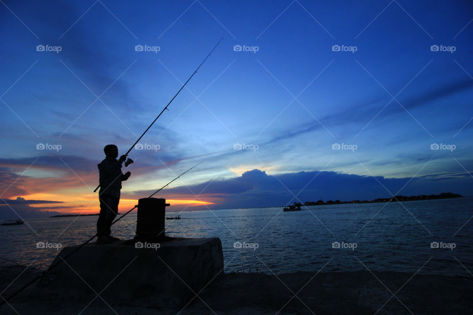 Fishing in dusk