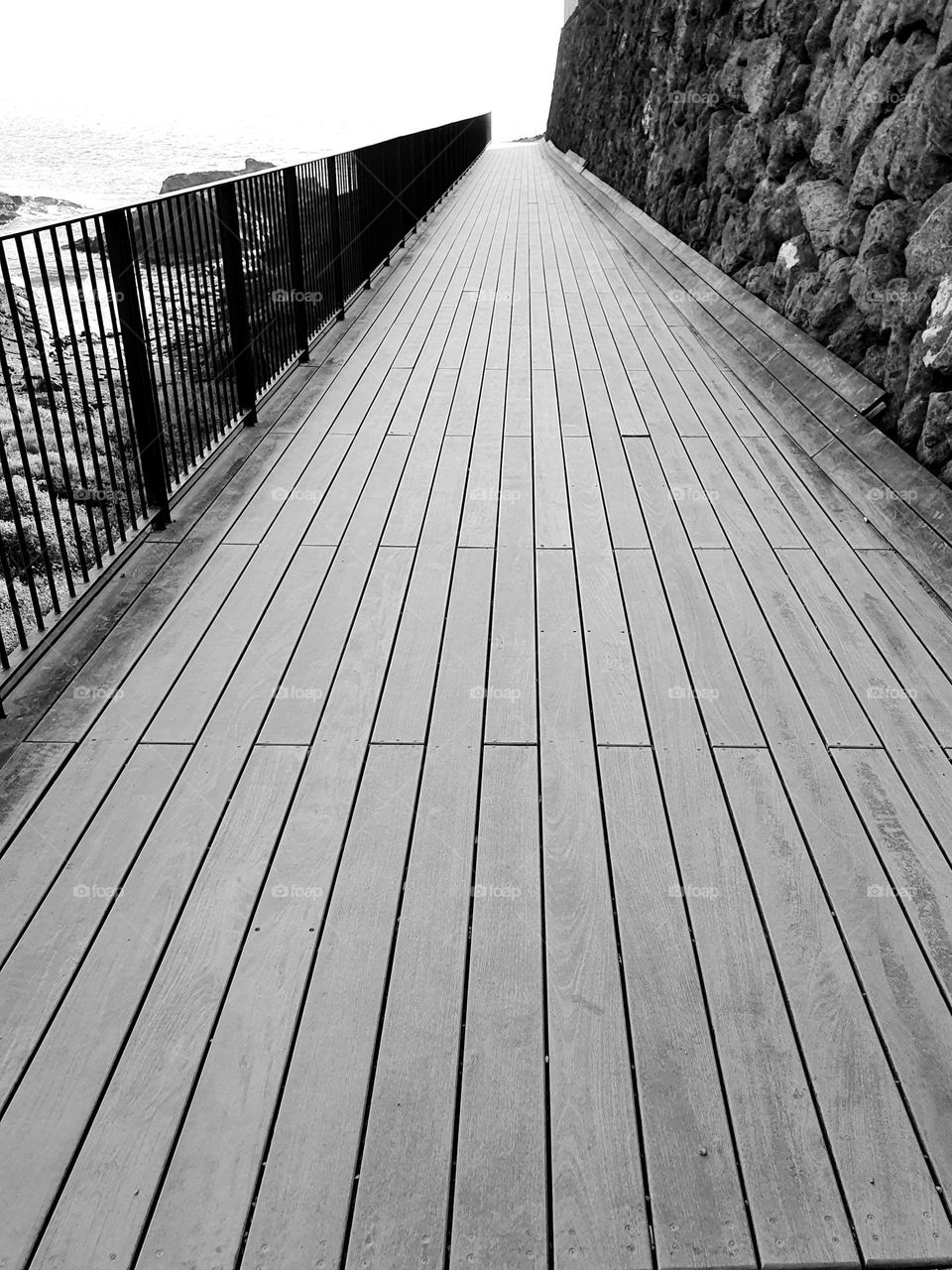 rectangle  - long wooden bridge by the sea