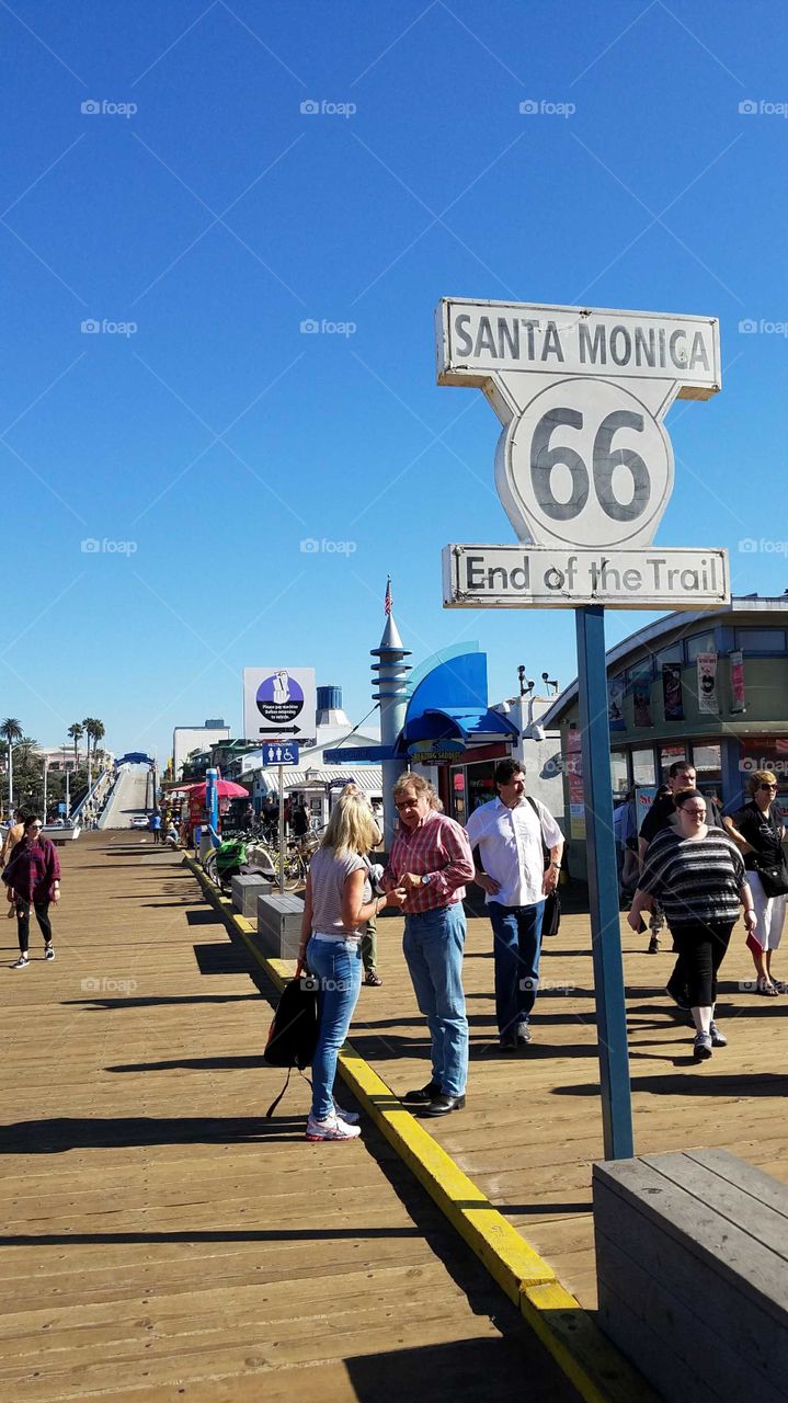 The end of "The Famous Route 66 end on the Santa Monica Pier running into the Pacific Ocean