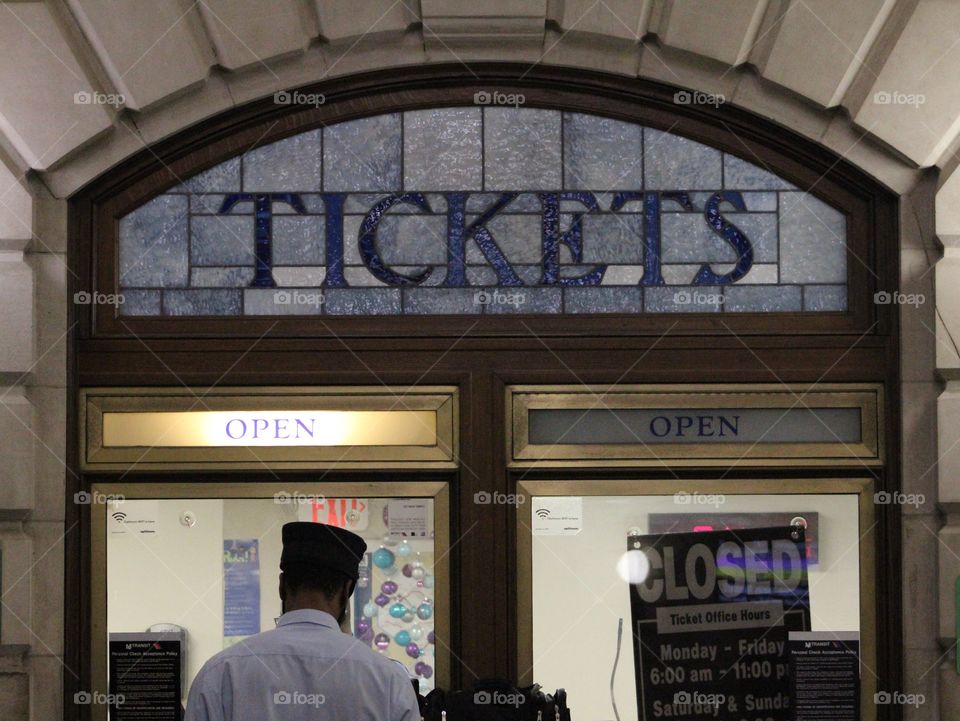 Ticket window with Tiffany glass at Lackawanna train terminal in Hoboken, New Jersey 