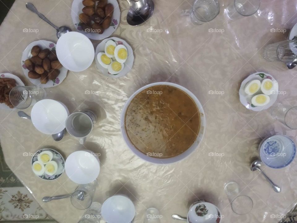 Moroccan table in Ramadan month:  Soup. Date and eggs.