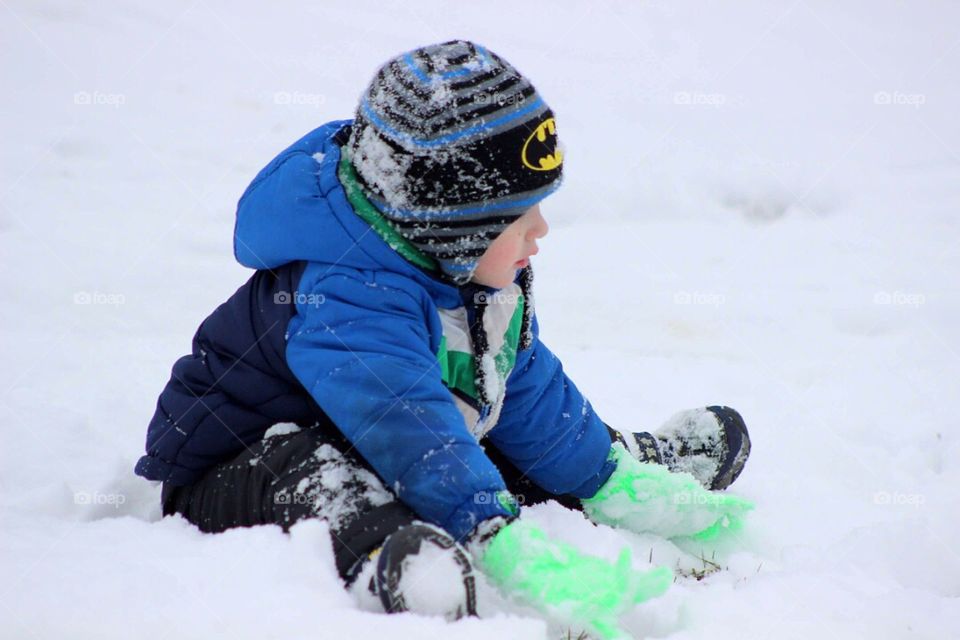 Boy Playing in snow