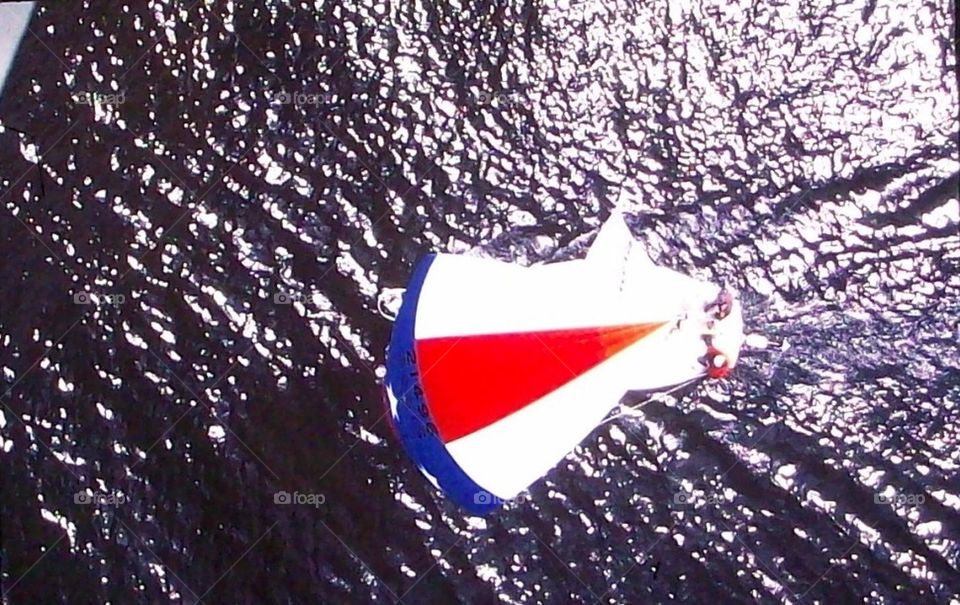 sailboat from above ocean water