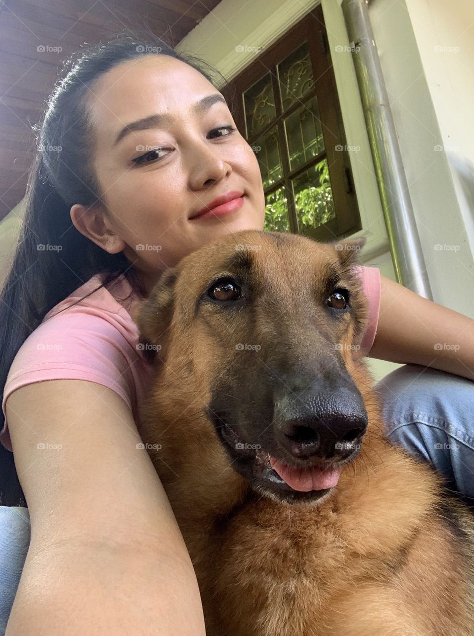 Selfie myself with my dearest dog calls Viola, German Shepherd dog who does not care the whole world but lovely and kind still, especially when she saw dog snacks in my hand.