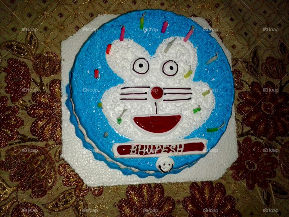 My birther's birthday cake its cake image is doremon . Doremon is the cartoon of pogo channel . This cake for each and every people will be given compliment . This cake is so testy which is made by special booking . This is egg cake .
