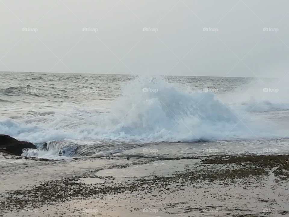 Sea water splashing on a evening
