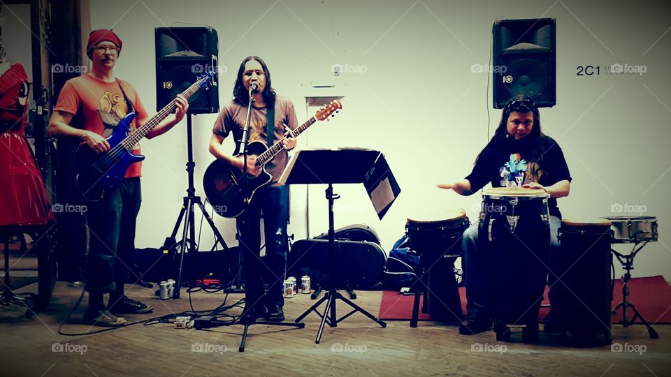 Group of team performing musician on stage