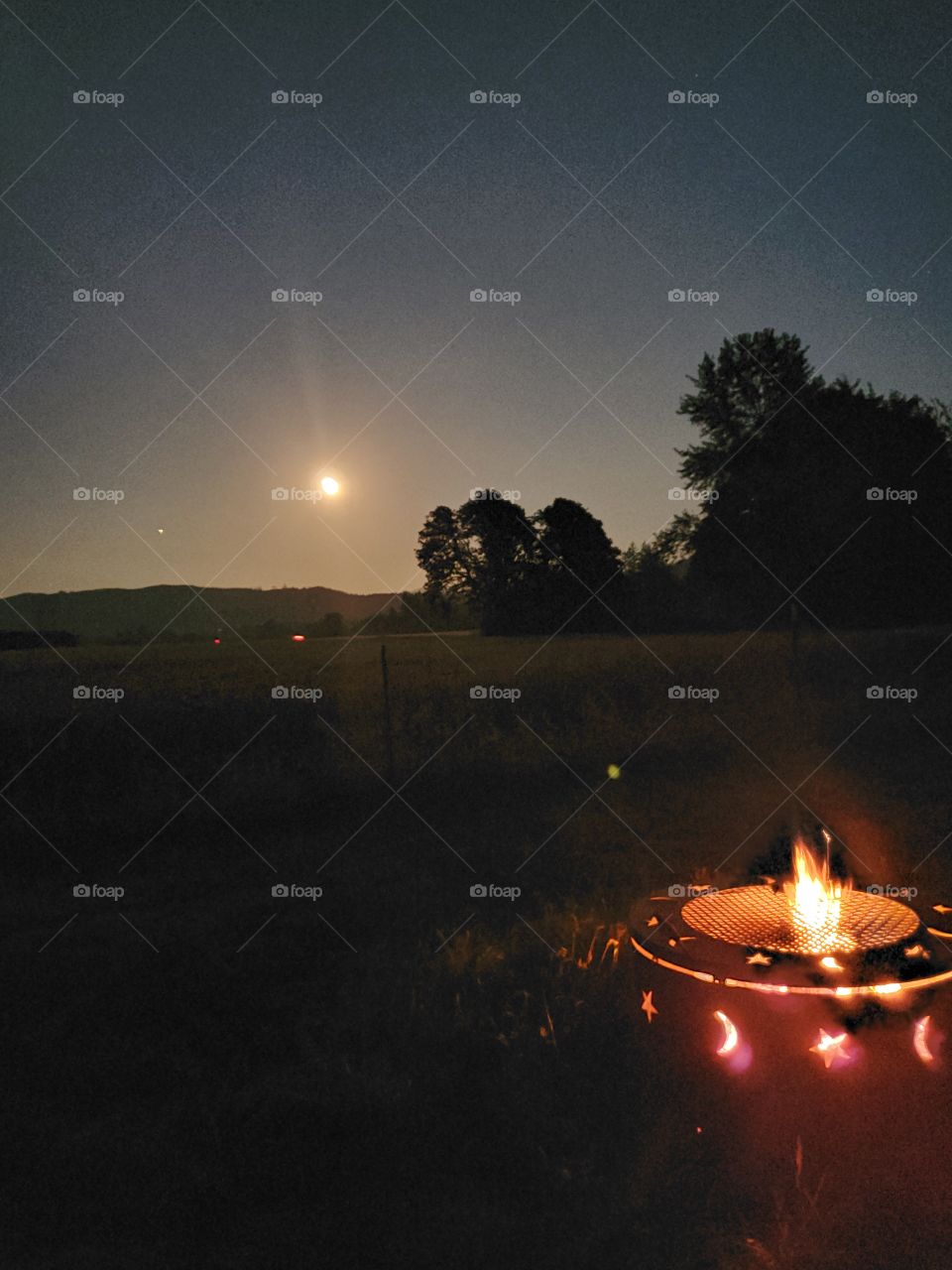 orange lunar eclipse fullbuckmoon firepit starsandmoons summernights