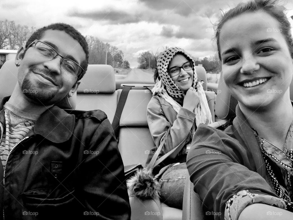 My sister, my fiancé, and I in my BMW convertible