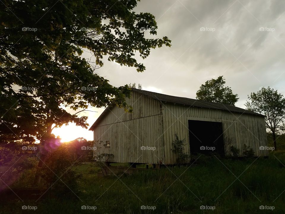 Sunset at the old white barn