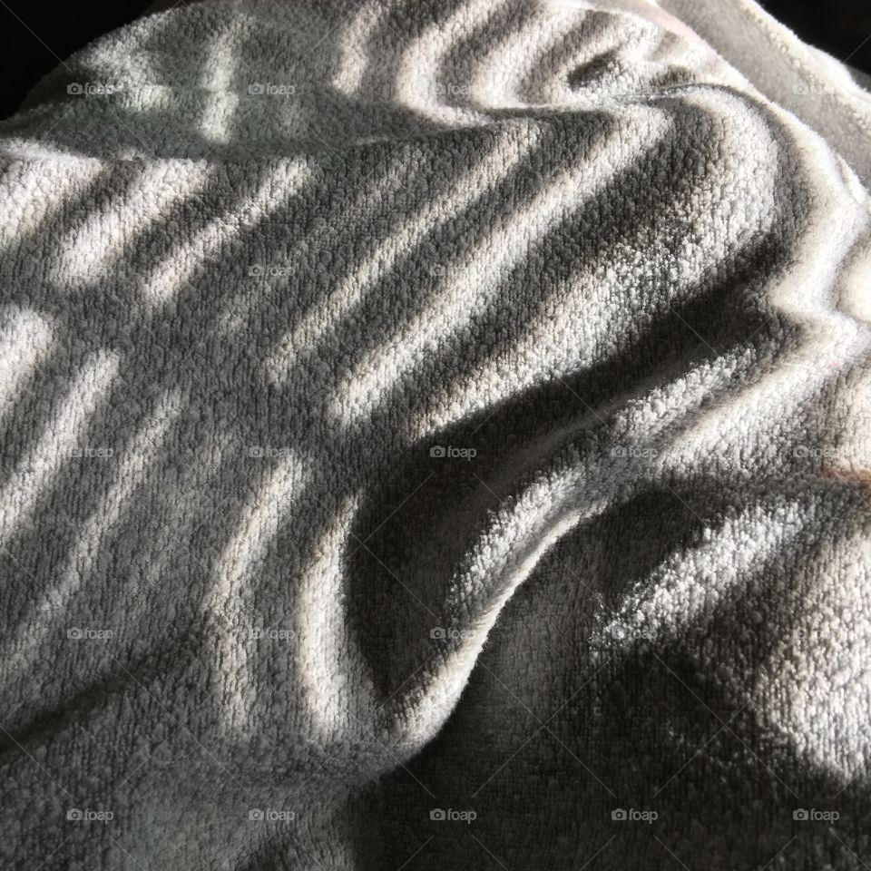 Play of Shadows on Fabric.