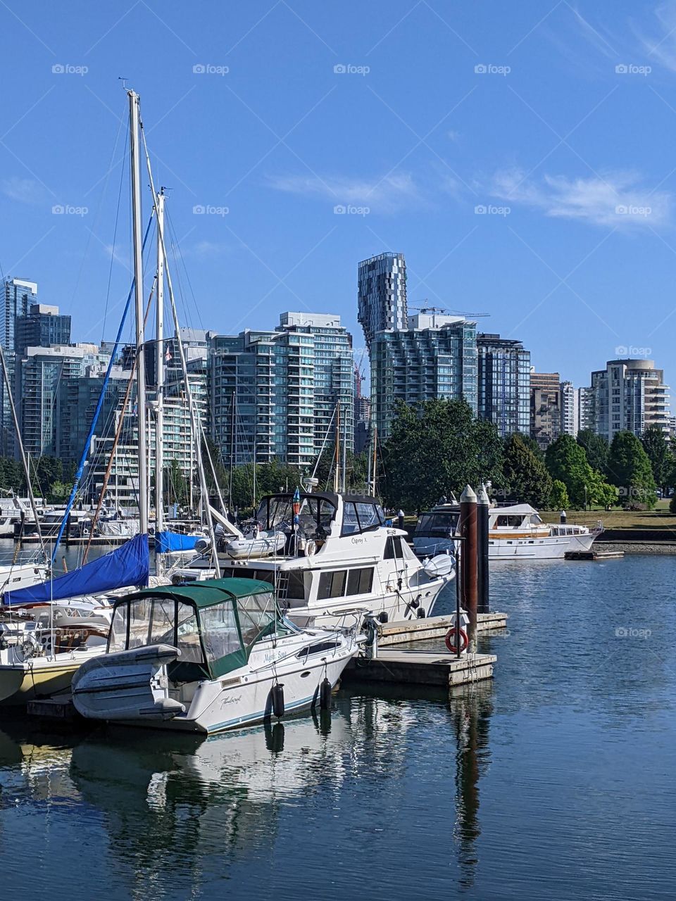 small sailing boats in the harbour of the city of Vancouver