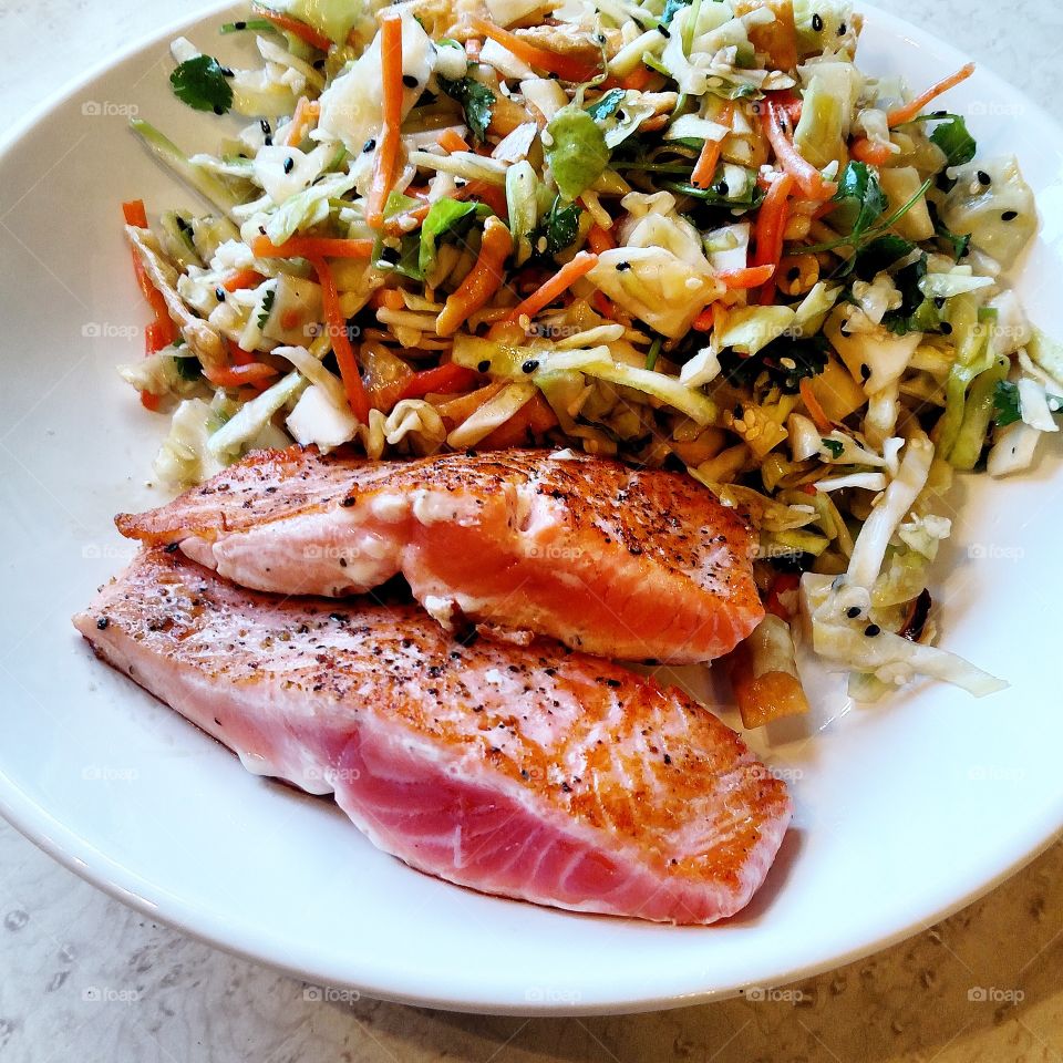 salmon with salad.