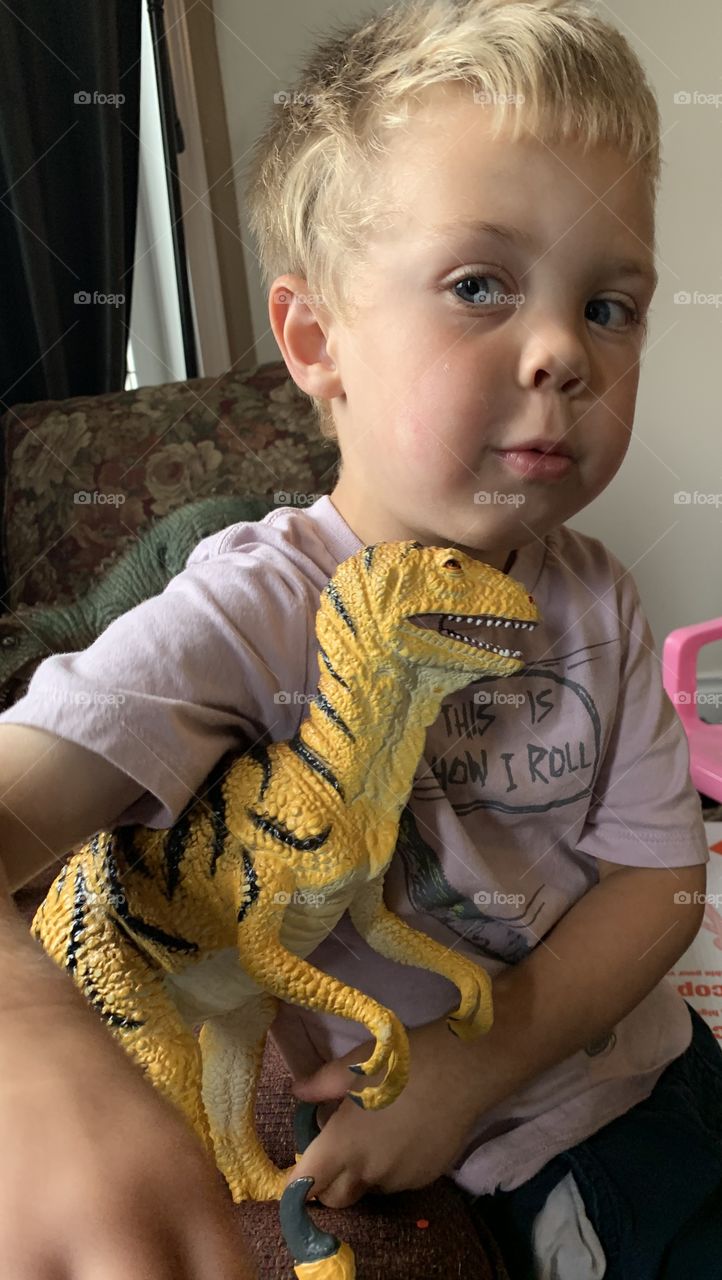 My son with his velociraptor 