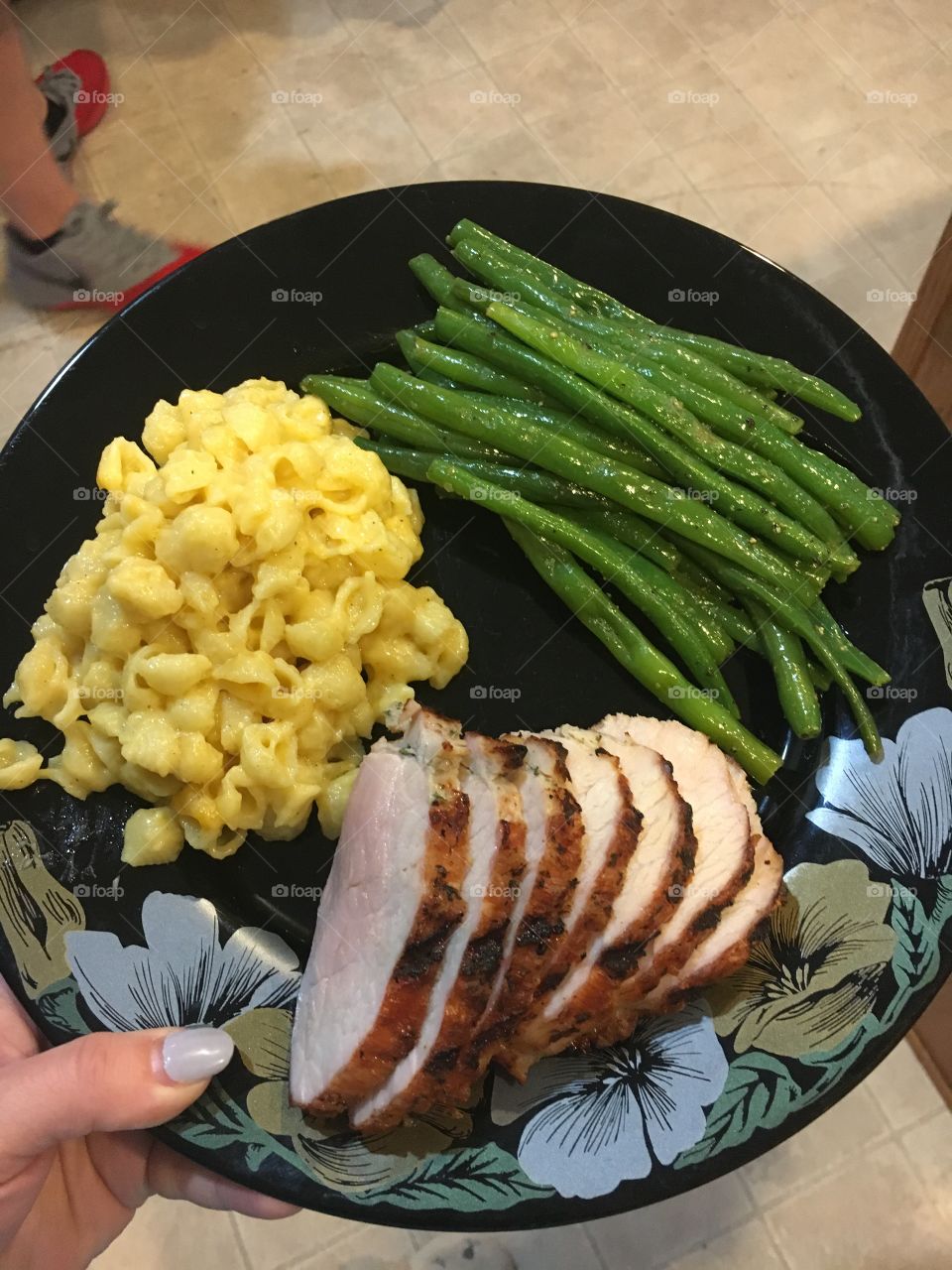 Pork loin with homemade Mac and cheese and steamed green beans