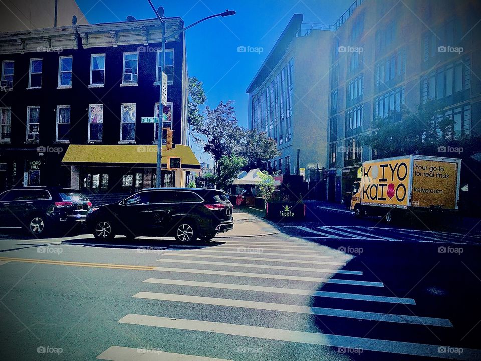 Sunlit Fulton Street in Forest Green, Brooklyn, New York on a summertime afternoon in 2020. Hypnotic Productions