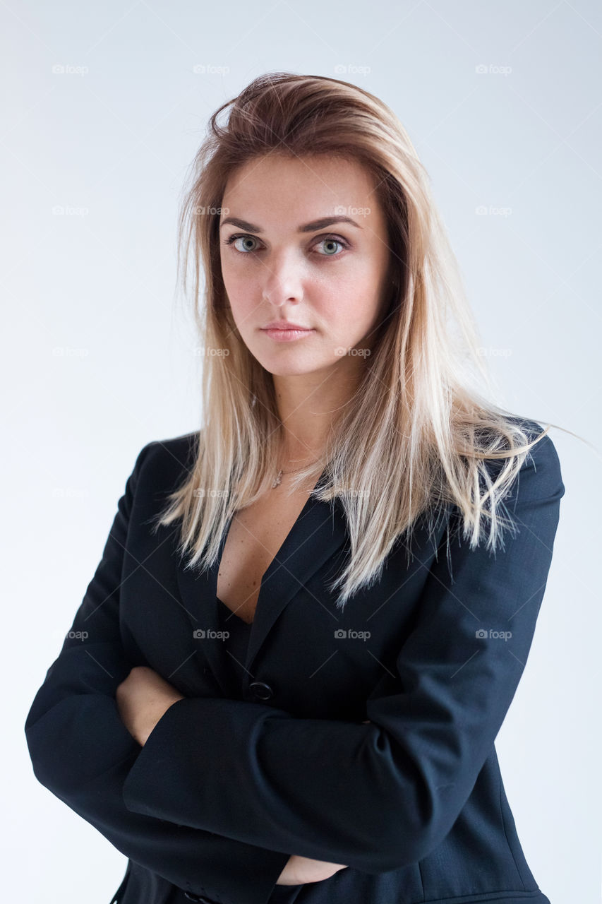 Beautiful blond girl posing on camera