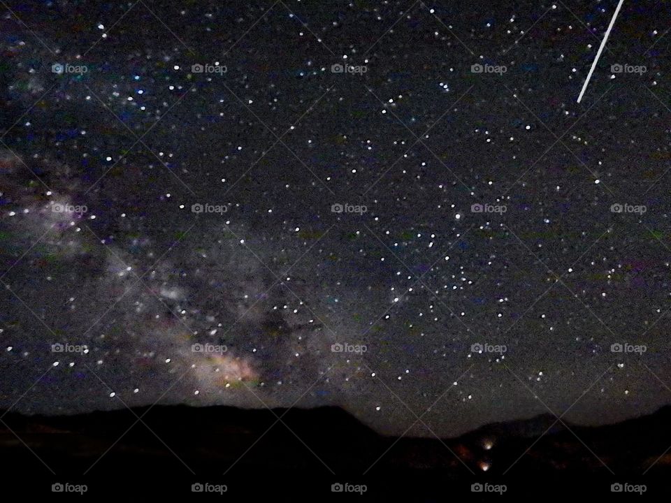 milky way and shooting star. over Gardiner Montana