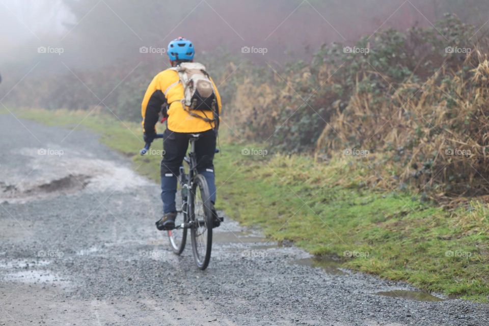 Biker on a dirt road 