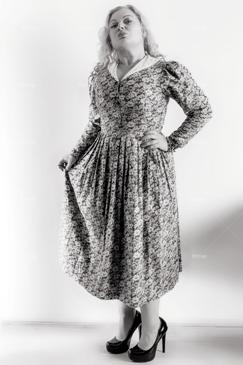 woman wearing vintage dress high heels