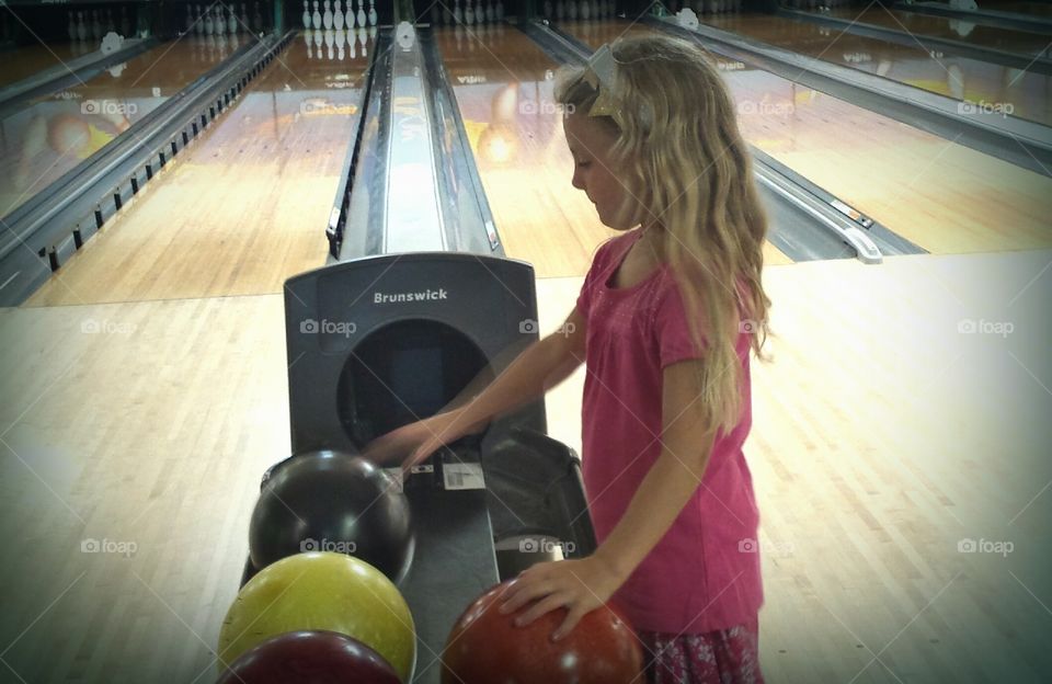 Little Girl Bowling