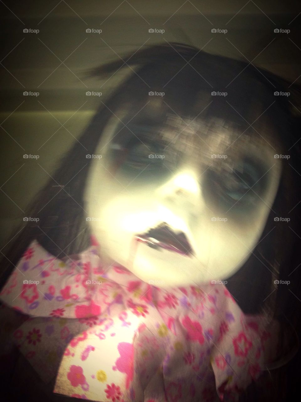 Blurred gothic China doll with red lips