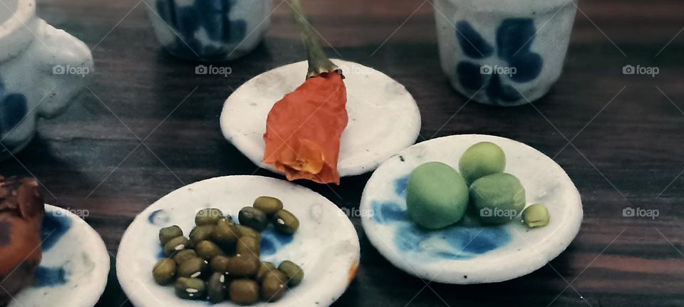 bold colors on the table of my kitchen that my daughter fixes today for her doll