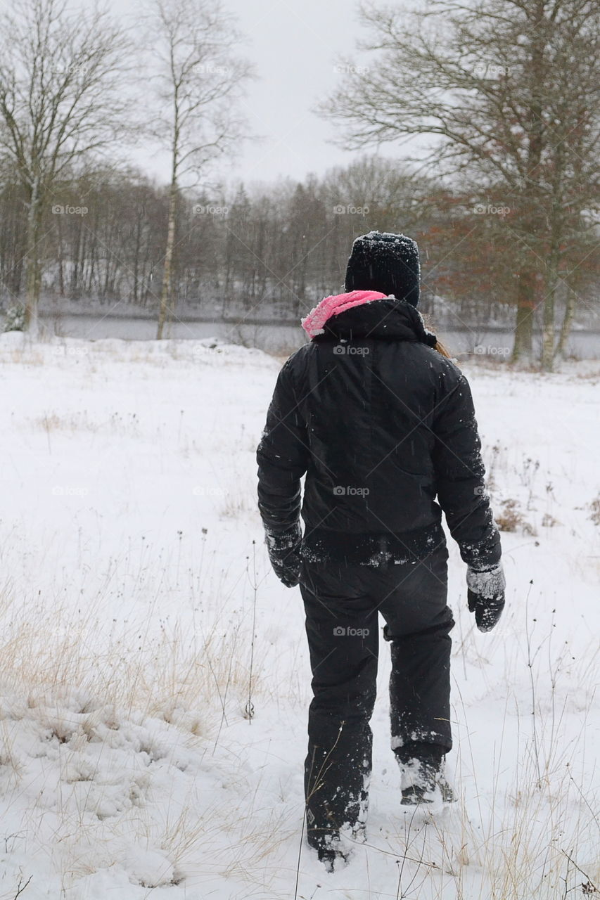 Girl in a cold winter landscape