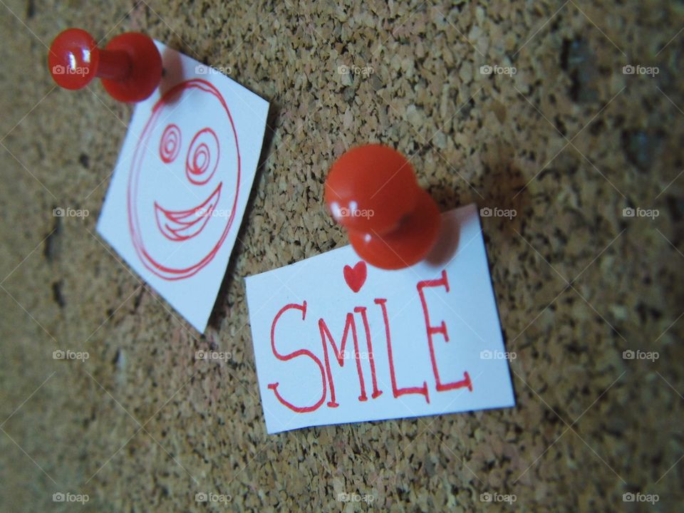 Sticky note with smile text